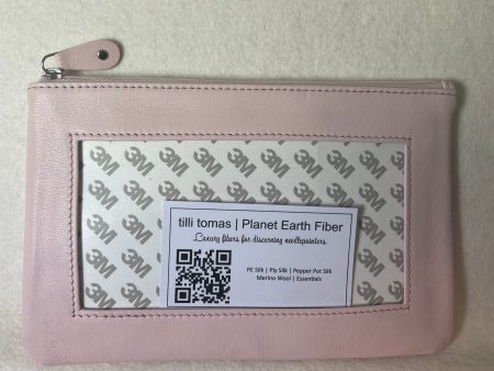 Planet Earth Lamb Skin Zip with Tassel   Lt pink Supply